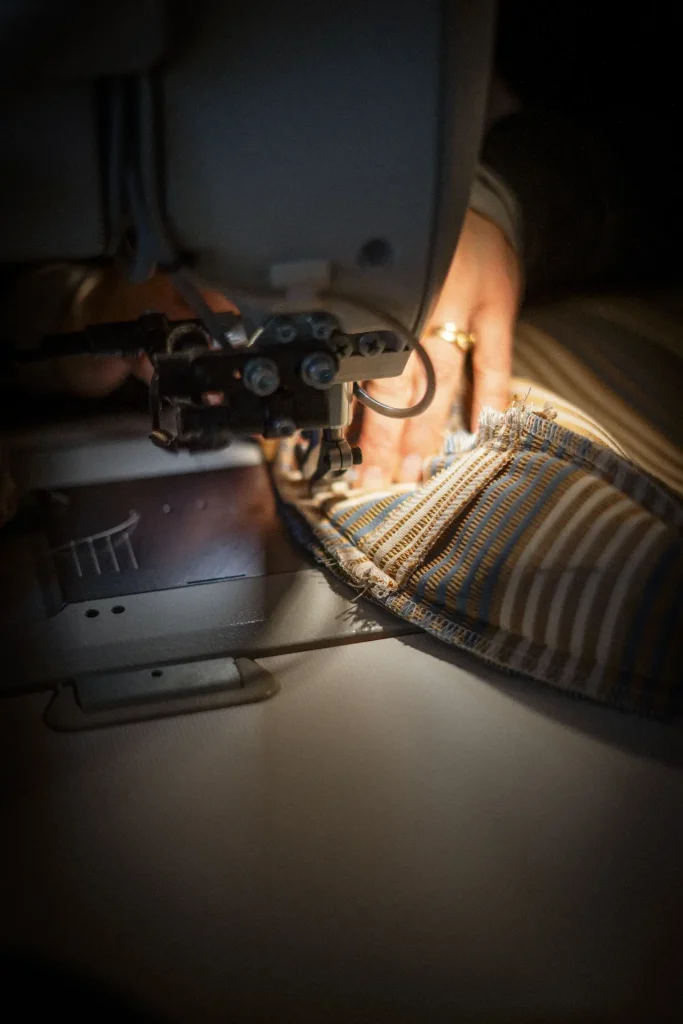 Handcrafted cushions in the Hervé Baume upholstery workshop.