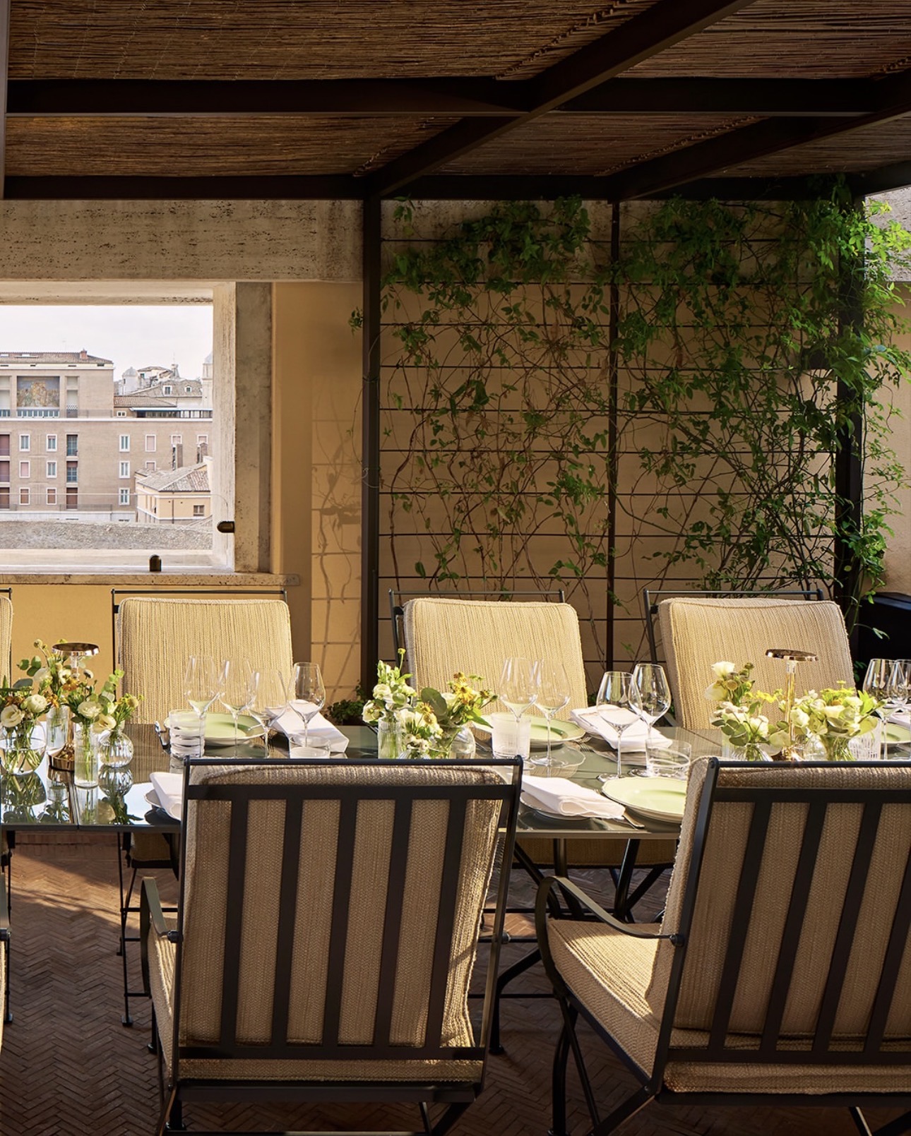 Hervé Baume wrought-iron furniture at Bvlgari Hotel Roma – HB12 chairs and HB30 tables.