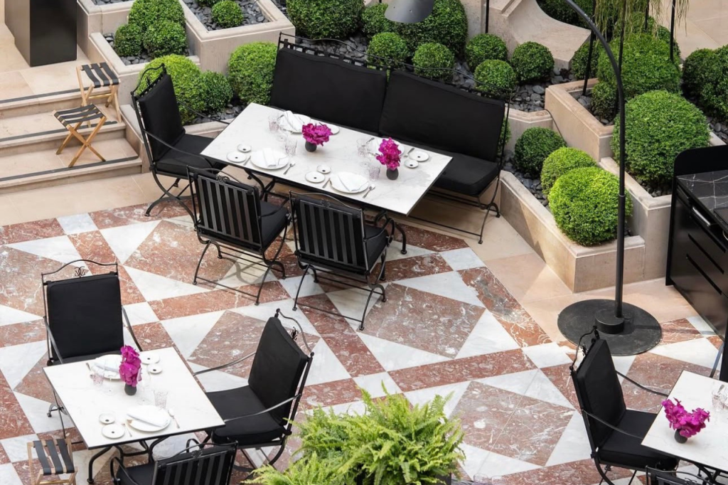 Hervé Baume HB3 Lattes Collection wrought-iron furniture on the terrace of Four Seasons Hotel George V, Paris.