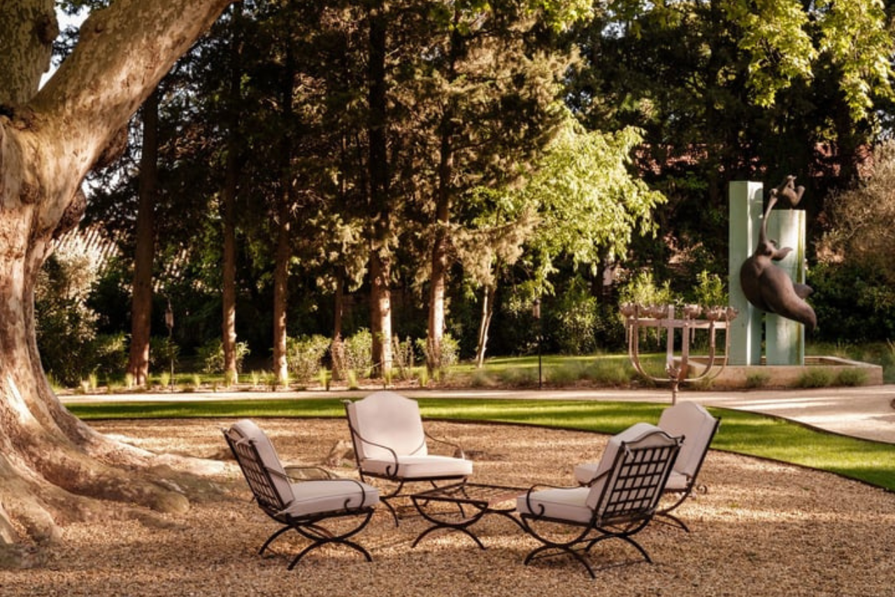 Hervé Baume wrought-iron outdoor lounge furniture in the shade of the plane trees, Mas de Chabran.
